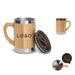 Side view image of a bamboo mug with stainless-steel at the top and bottom of the mug with the word logo printed on the side and a dark brown plastic sip lid. Image also shows the mug from top view